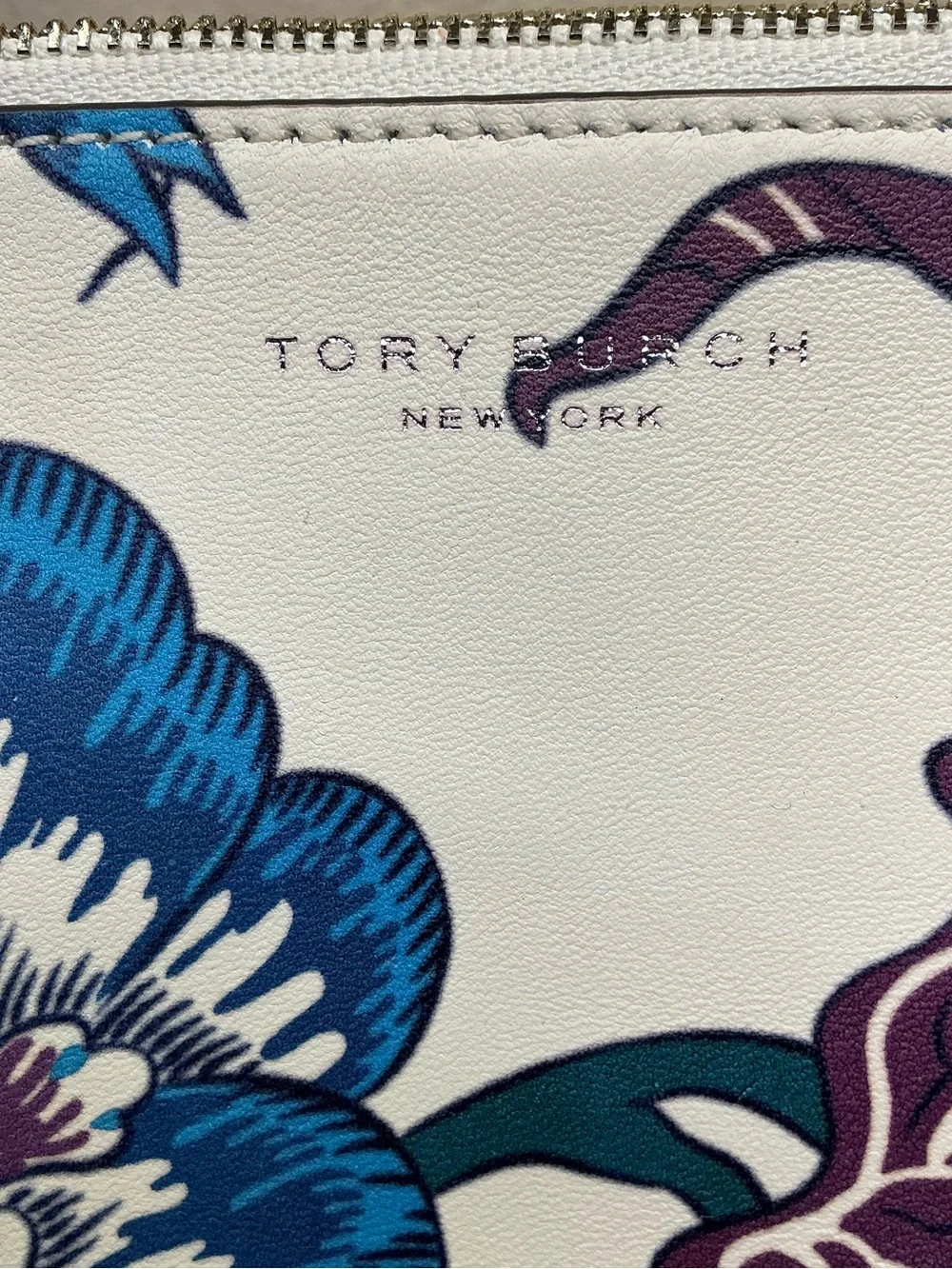 Tory Burch Rory White Floral Pouch with Blue and Purple Accents